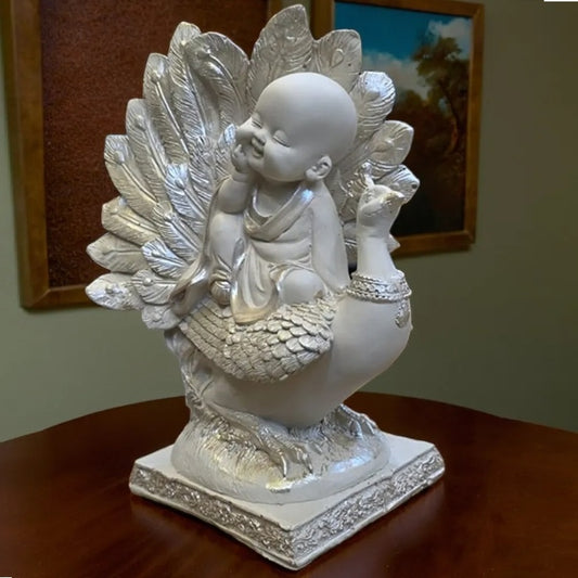 White Smiling Buddha Sitting on Peacock Resin Statue | EnamorarDecor