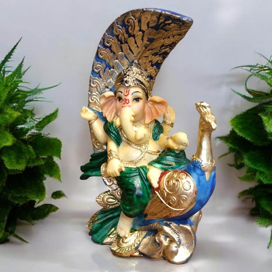 Multicolor Ganesha Sitting on Peacock Resin Statue | EnamorarDecor