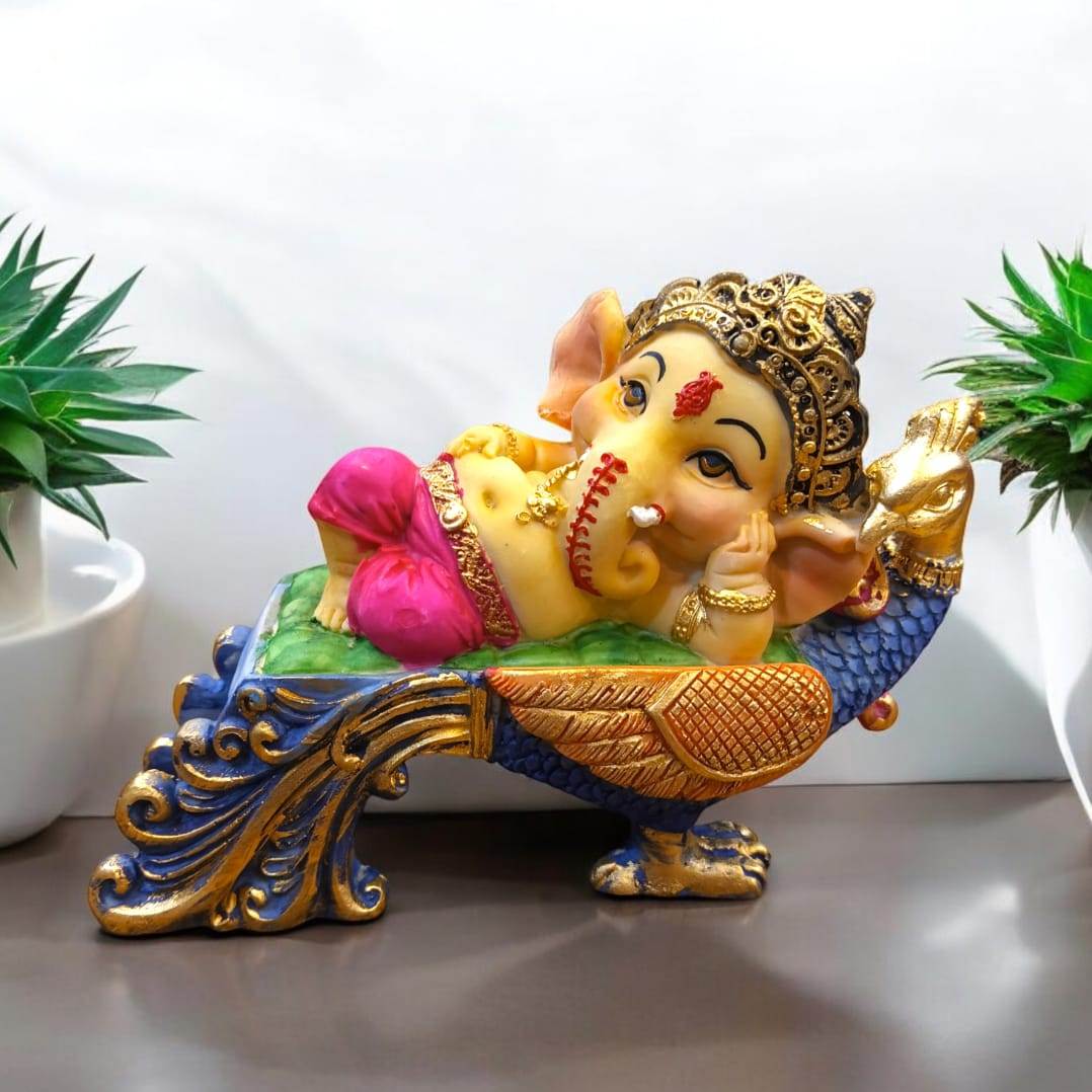 Multicolor Ganesha Lying on Peacock Resin Statue | EnamorarDecor
