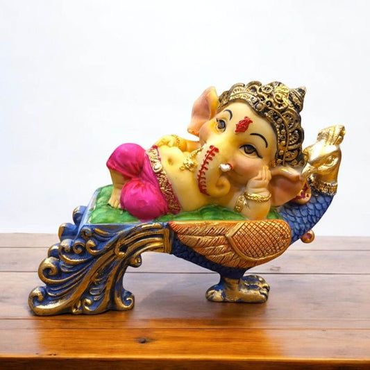 Multicolor Ganesha Lying on Peacock Resin Statue | EnamorarDecor