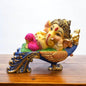 Multicolor Ganesha Lying on Peacock Resin Statue | EnamorarDecor