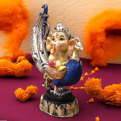 Multicolor Ganesh Sitting on Peacock Resin Statue | EnamorarDecor
